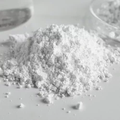 A pile of white granulated powder formulation.